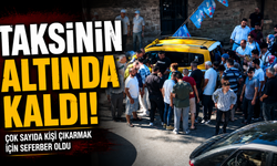 Genç avukat taksinin altında kaldı, çok sayıda kişi çıkarmak için seferber oldu