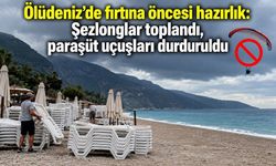 Ölüdeniz’de fırtına öncesi hazırlık: Şezlonglar toplandı, paraşüt uçuşları durduruldu