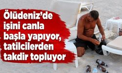 Ölüdeniz’de işini canla başla yapıyor, tatilcilerden takdir topluyor
